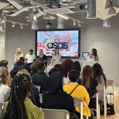 ASOS staff attend a talk about Centrepoint's work