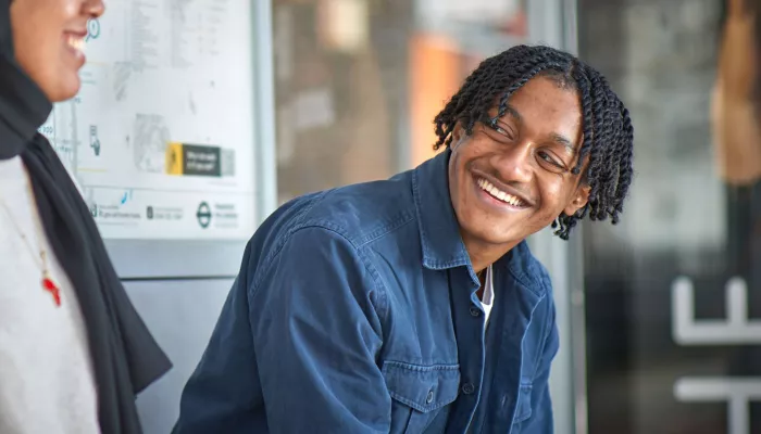 Young person at bus stop