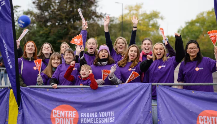 Team of Centrepoint volunteers cheering on runners