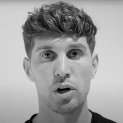 Black and white screenshot of footballer John Stones