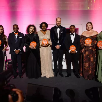 Our Centrepoint Awards winners stand on stage with HRH Prince of Wales and CEO Sey Obakin